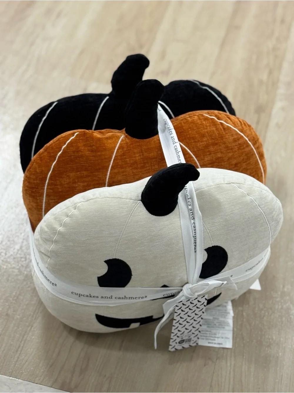cupcakes & cashmere Pumpkin Stack Decorative Pillows in Cream, Orange, Black